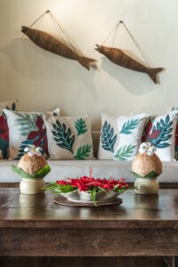 Pacific Resort Aitutaki - Premium Beachfront Bungalow lounge area with welcome drinks